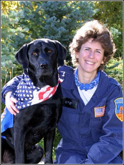 Black lab with owner